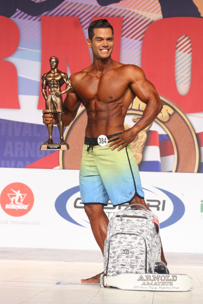 Winners Announced for the 11th Annual Arnold Amateur Bodybuilding, Fitness, Figure, Bikini and Physique Championships 9 Men’s Physique Overall Winner Geder Gomes of Brasil 384 Photo by Carl Wade