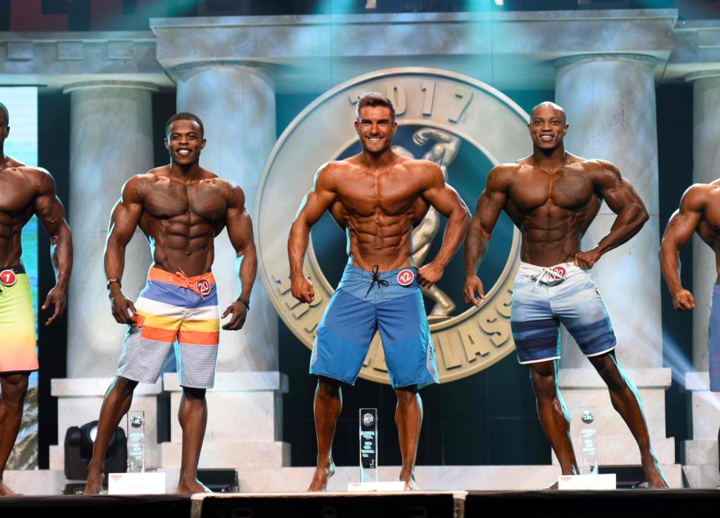 Men's Physique winner Ryan Terry (center) 2nd Andre Ferguson (lt) 3rd Brandon Hendrickson (rt)-Photo by Oliver Hamlin