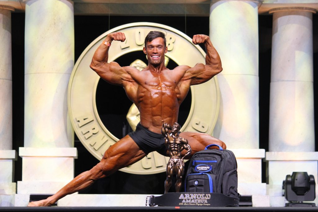 Winners Announced for the 12th Annual Arnold Amateur NPC Bodybuilding, Fitness, Figure, Bikini & Physique Championships 9 Classic Physique Overall Winner Lucas Disanti 406