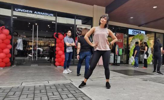 DJ Rica of Monster RX 93.1 hosted the ribbon cutting for the newly opened outlet stores of Under Armour and Crocs.