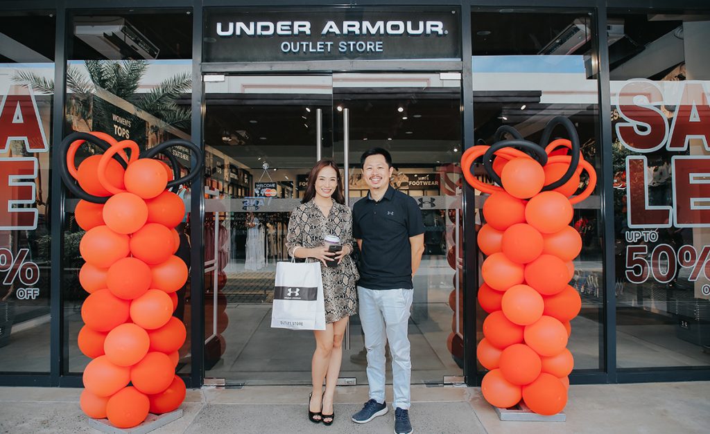 Princess Legaspi, Acienda's new ambassador and Mark Chan Mark Chan, President of Walk EZ Ratail Corp. in front of the new Under Armour Outlet Store